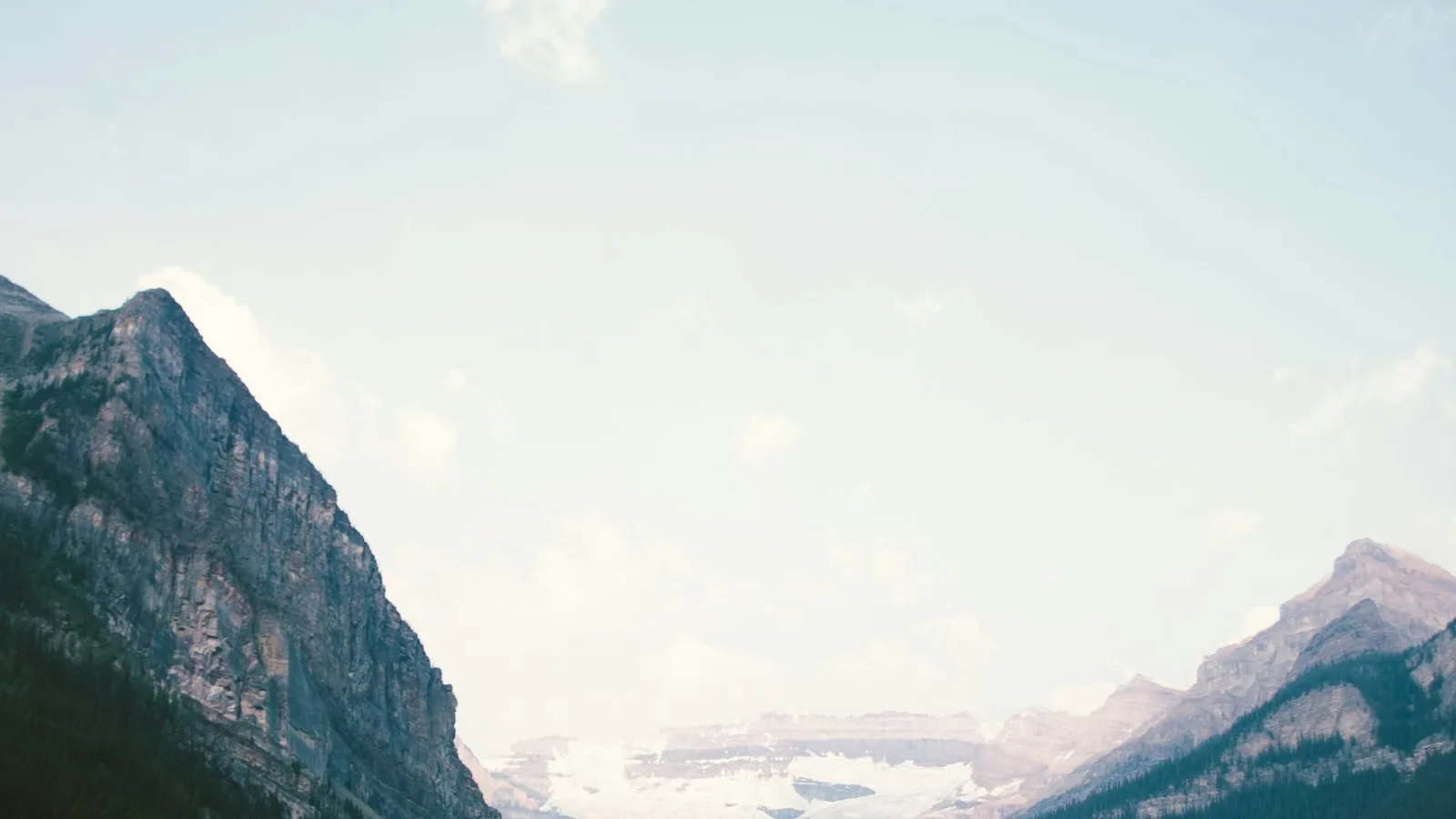 Mountain photo with the caption Lake Louise, Canada added — Before