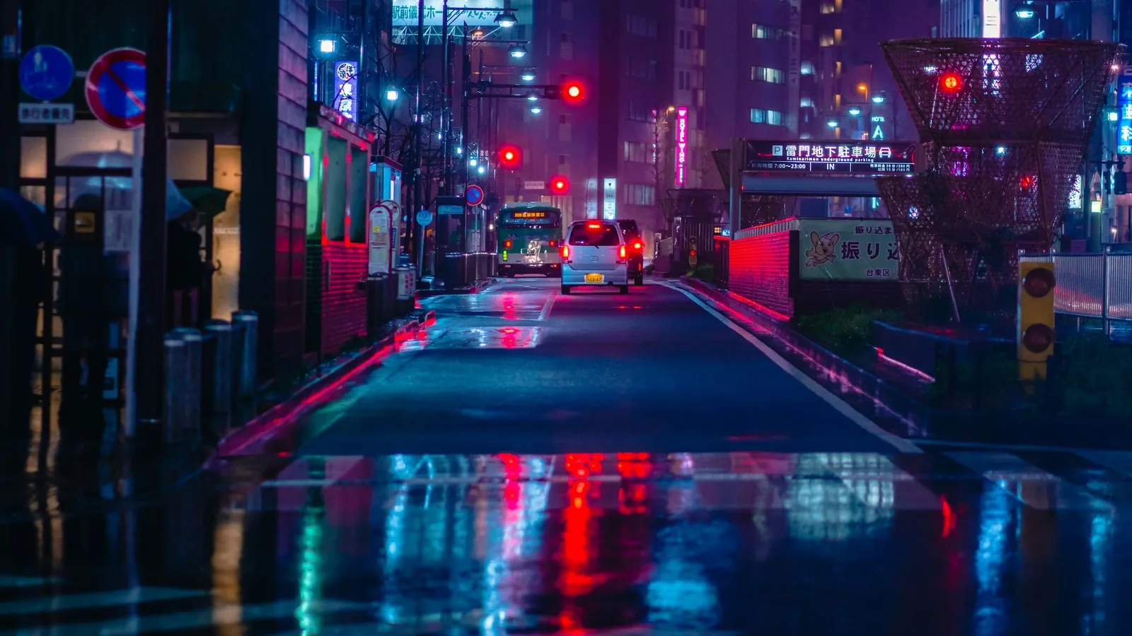 Rainy neon street at night in Tokyo